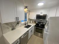 More Details about MLS # 5046335 : 5401 E WARREN AVENUE 202